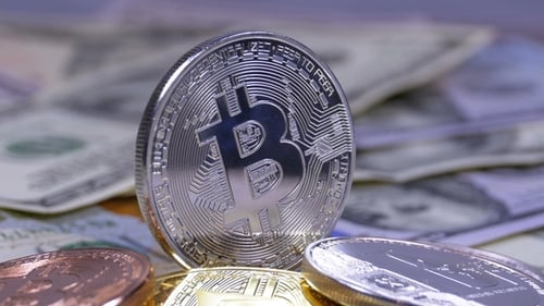 Silver Bitcoin Coin, BTC and Bills of Dollars Are Rotating