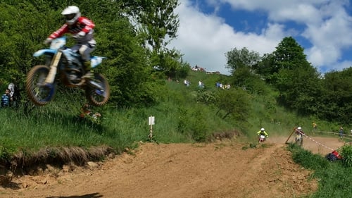 Dirt Bikes Racing on a Rural Motocross Track