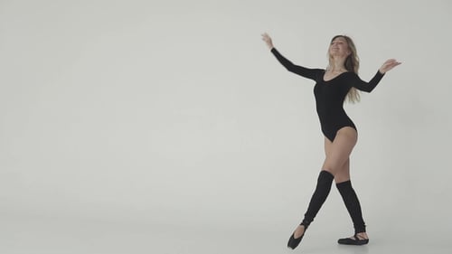 Young Adult Woman Dancing in Leotard