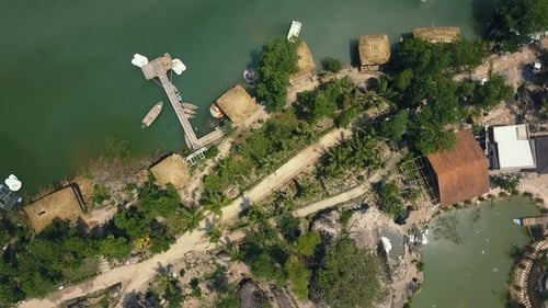 Aerial Shoot Boat Pier and Bungalow for Rest on Lake.