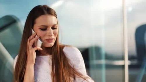 Sale, Consumerism: Young Woman with Smartphones and Shopping Bags Standing and Talking Near Shopping