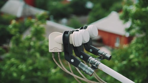 Satellite Dish Receiving Signals in Urban Setting