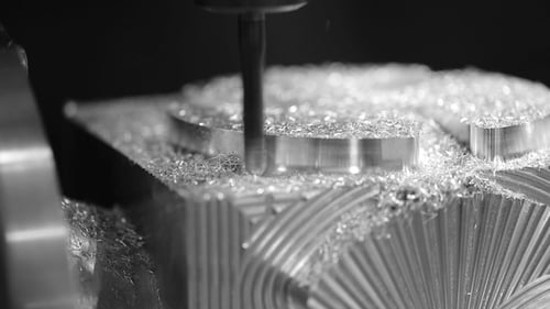 Automated Milling Machine Shaping Metal Object