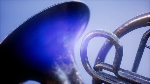 Metallic Brass Instrument Rotating with Elegant Light Reflections
