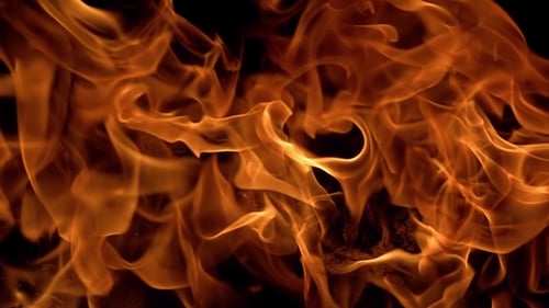 Abstract Fiery Flames Burning on Black Background