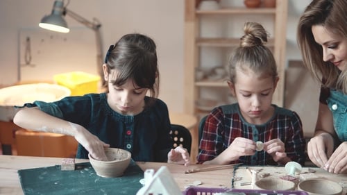 Children and Woman Crafting with Clay Together