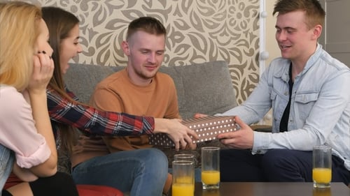 Friends Celebrate Birthday With a Gift at Home