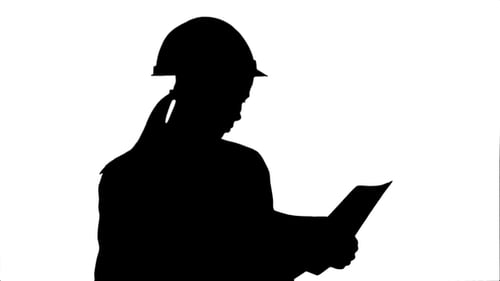 Silhouette Female Engineer in Helmet Reading Contract and Nodding Her Head