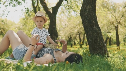 Mother and Child Enjoying Time Outdoors in Park