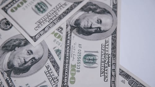 Pile of United States One Hundred Dollar Bills