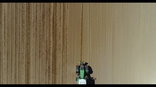 Tractor Working in Beautiful Spacious Agricultural Field