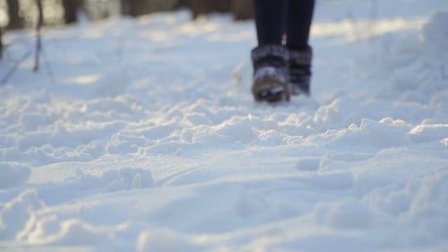 Woman in Winter Boots Walk on Snow