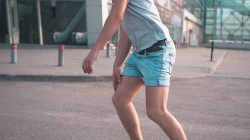 Skater Rides on Road
