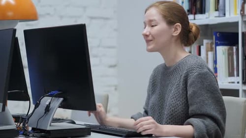 Online Web Video Chat By Redhead Woman at Work in Office