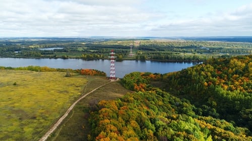 High Voltage Transmission Towers on River Banks