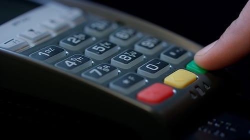 Use Credit Card. Man Hand with Credit Card Swipe Through Pos Terminal