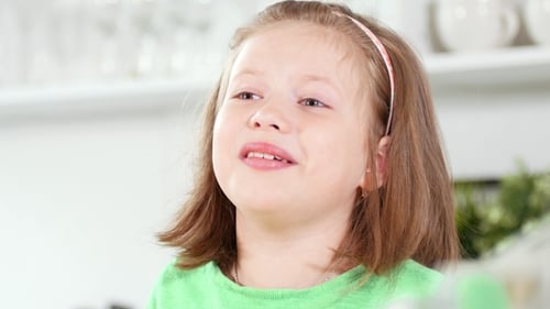 Baby Girl Laughing Pointing Finger and Having Fun at Studio