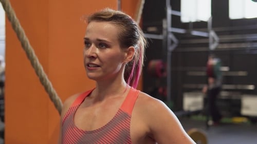 Face of Tired and Satisfied Fitness Woman After Workout in Gym