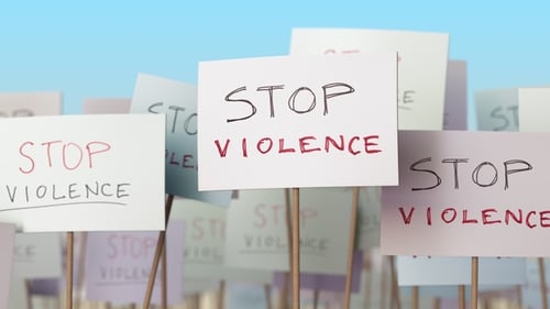 STOP VIOLENCE Placards at Street Demonstration