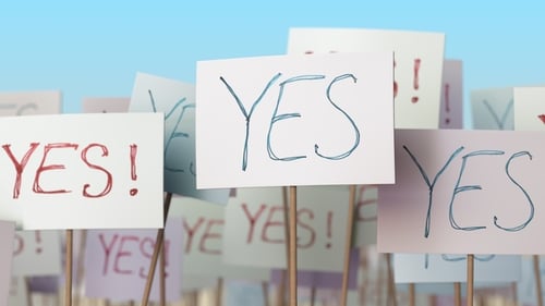 YES Placards at Street Demonstration