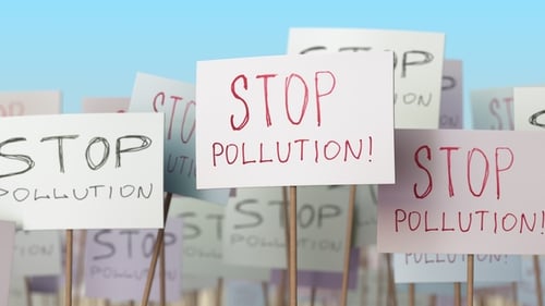 STOP POLLUTION Placards at Street Demonstration