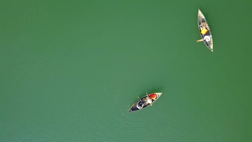 Resting People Riding in Boat on Lake During Summer Holiday. People Swimming on Boat on Lake Water