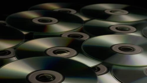 Prise de vue rotative de disques compacts
