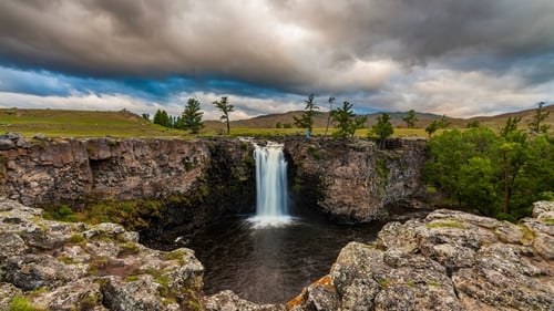 Sunset Over Waterfall Ulaan Tsutgalan, Mongolia
