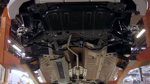 Transporting Cars on an Assembly Line, Preparation for Installing Wheels on a Car Plant