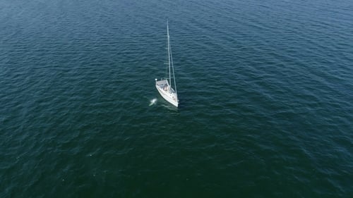 Aerial View of a Sailboat on Ocean