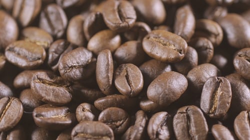 Slow Rotation of the Heap of Coffee Beans