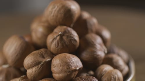 Close Up of Shelled Hazelnuts Rotating