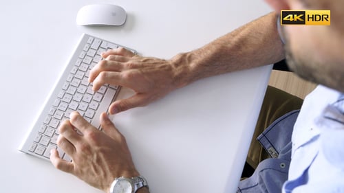 Freelancer Typing On Keyboard