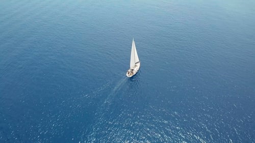Yacht Sailing on Opened Sea. Sailing Boat. Yacht From Drone. Yachting Video. Yacht From Above