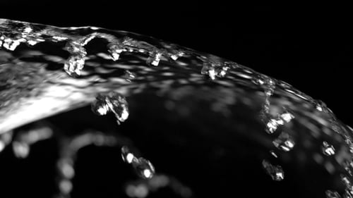Abstract Water Flowing Against a Black Background