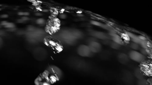 Abstract Viscous Water Against a Black Background