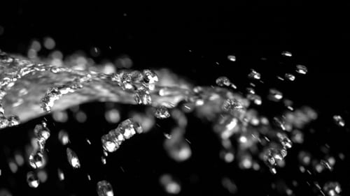 Splashing Water in Slow Motion on Black Background