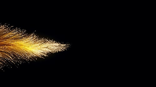 Abstrakte orangefarbene Partikel aus optischen Fasern