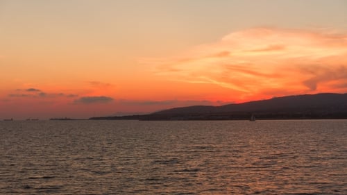 Beautiful Sunset Over Sea and Yacht