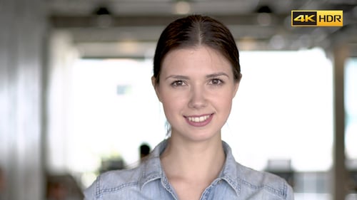Portrait of a Young Adult Woman in Office