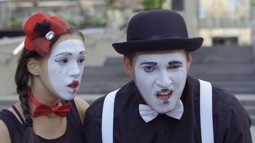 Mimes Making Faces in Urban Environment