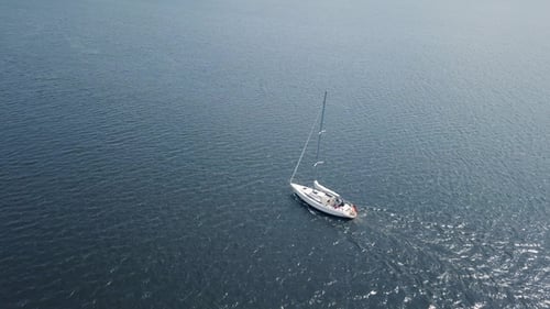 Aerial View of Yacht Sailing in Sea