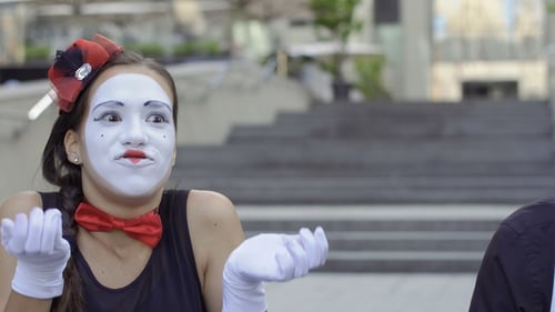 Expressive Mime Duo Performing in Urban Setting