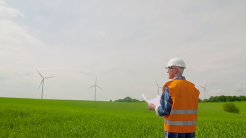 Engineer Doing Windmill Inspection
