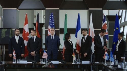 Business Professionals Shaking Hands at International Meeting