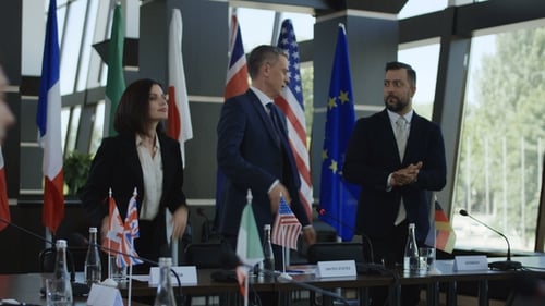 International Meeting: Business People Handshake Agreement