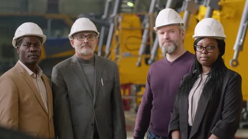 Group Portrait of Multiethnic Factory Engineers