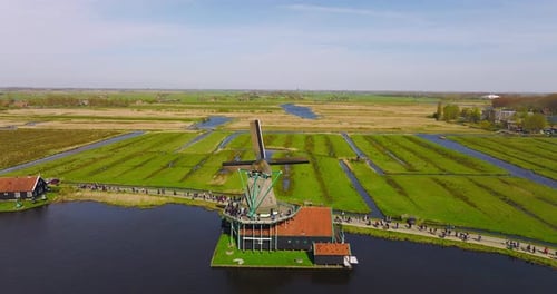 Classic well kept Dutch wooden Windmills in Zaanse Schans, Drone footage.