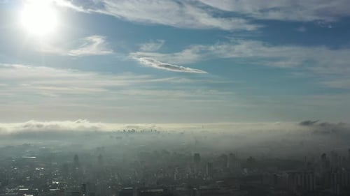 City Shrouded in Mist Aerial View