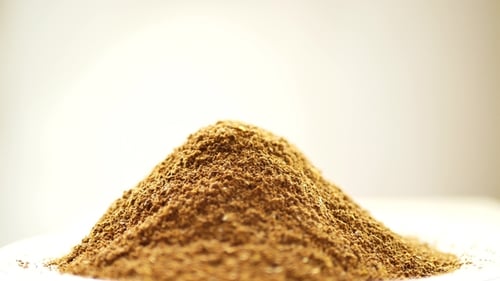 Ground Brown Powder on White Surface